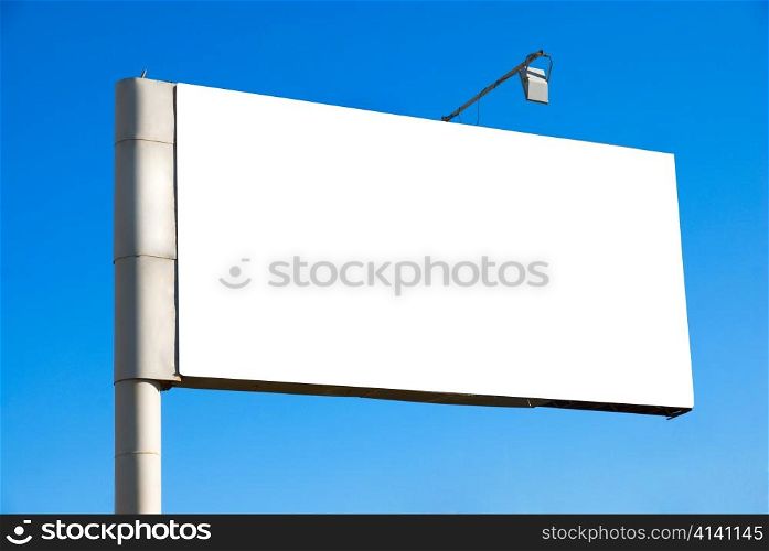 Blank billboard over blue sky background