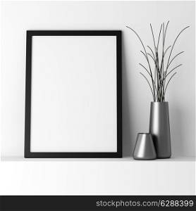blank black photo frame on white shelf