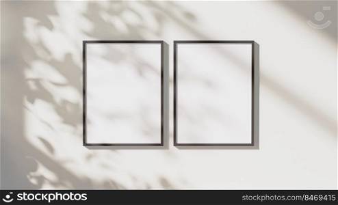 blank black vertical frames mock up with leaves shadows and sunlight on white wall background, 3d rendering