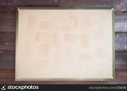 Blank board on wooden wall, stock photo