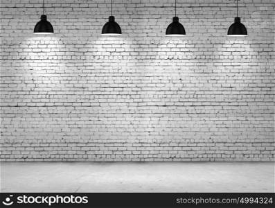 Blank brick wall. Blank brick wall with place for text illuminated by lamps above