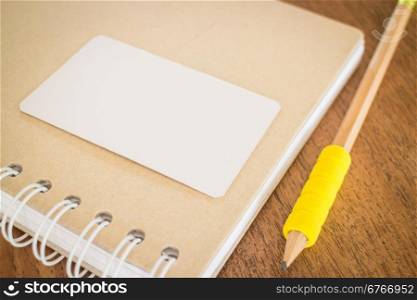 Blank business cards on wooden table, stock photo