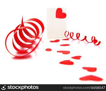 Blank card with red heart &amp; ribbon isolated on white background, conceptual image of love &amp; Valentine&rsquo;s day holiday&#xA;