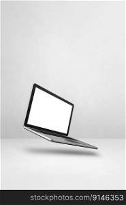 Blank computer laptop floating over a white background. 3D isolated illustration. Vertical template. Floating computer laptop isolated on white. Vertical background