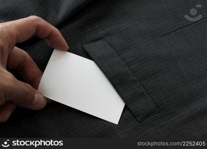 Blank corporate identity package business card with dark grey suit background.