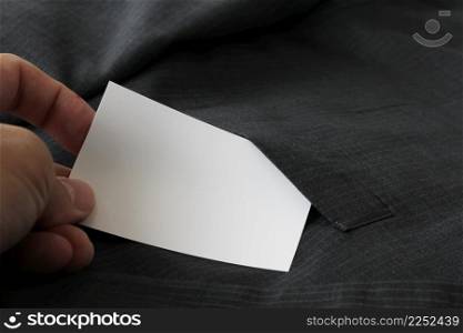 Blank corporate identity package business card with dark grey suit background.
