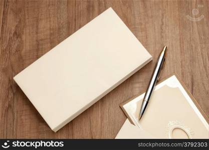Blank envelop with invitation card with pen