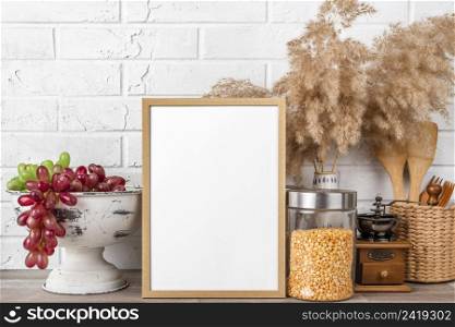 blank frame shelf beside flower pots