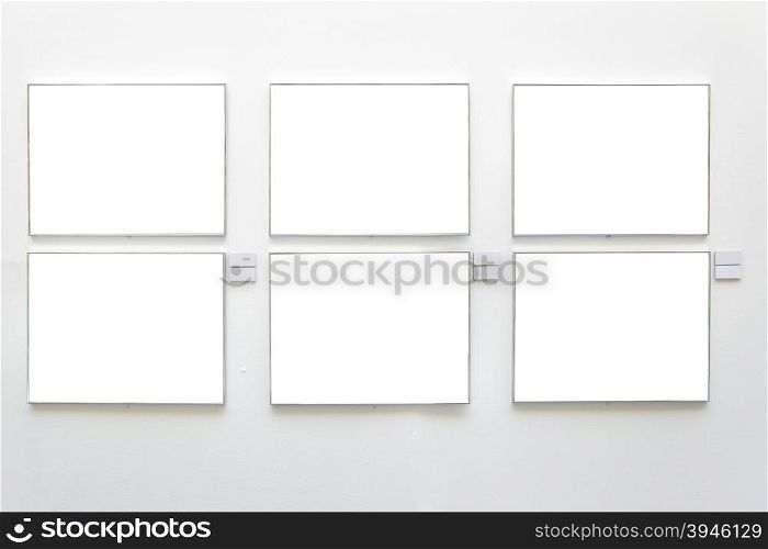 Blank frames on the wall at art gallery