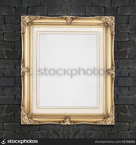 Blank Gold color vintage photo frame hanging on black brick wall,template for adding your photo.