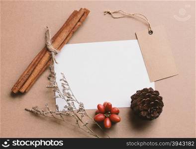 Blank greeting card and tag mock up with craft and christmas decorations