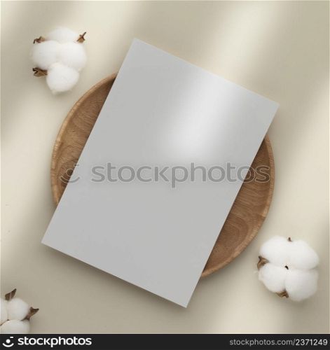 Blank greeting card invitation Mockup 5x7 on envelope with dry flowers and ribbon on beige background, flat lay, mockup