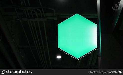 Blank hexagon lightbox signage hang on wall