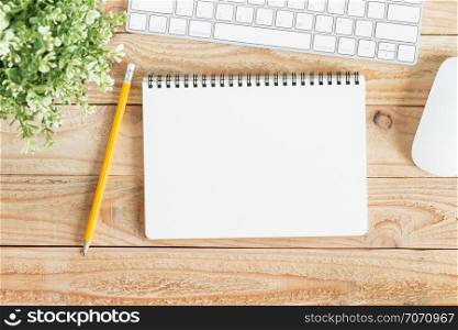Blank notebook and yellow pencil on brown wood,Flat lay photo of notebook for your message