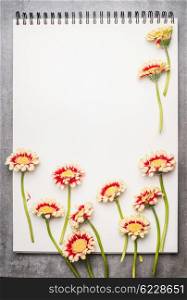 Blank notebook with border of lovely flowers