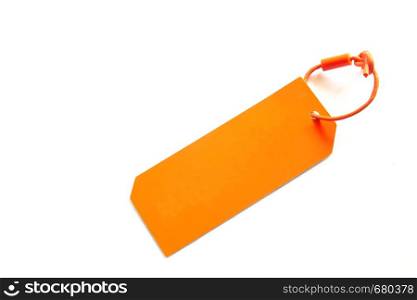 Blank orange color cardboard price tag isolated on white background