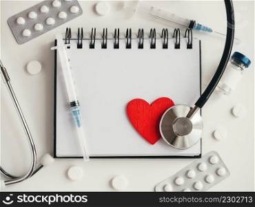 Blank page of notepad and place for your congratulatory inscription. Happy Doctor&rsquo;s Day. Closeup. Concept of preparation for a professional holidays. Congratulations for relatives, friends, colleagues. Happy Doctor&rsquo;s Day. Greeting Card. Close-up, top view