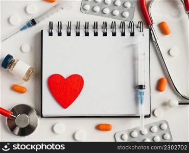 Blank page of notepad and place for your congratulatory inscription. Happy Doctor’s Day. Closeup. Concept of preparation for a professional holidays. Congratulations for relatives, friends, colleagues. Happy Doctor’s Day. Greeting Card. Close-up, top view