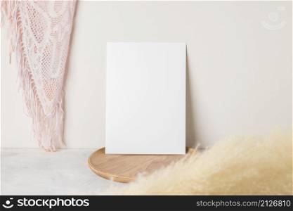 Blank paper cards, Greeting card Mockup with pampas grass on a wooden plate, beige background, Minimal beige workplace composition, mockup