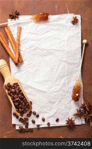 blank paper for recipes over wooden background with coffee and spices
