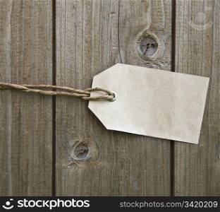 Blank Paper Price Tag On Wooden Background
