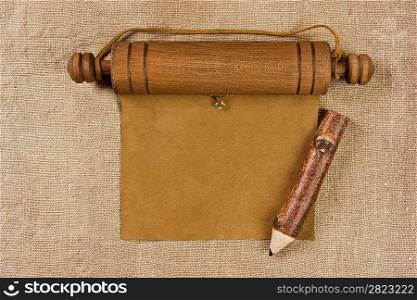 Blank parchment manuscript and pencil