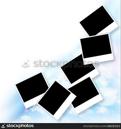Blank picture frames, abstract snowflake decorative border, beautiful blue ornamental design with white text space, many empty photo collage, black copy space for winter holidays image
