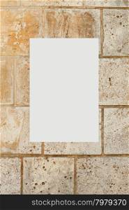 blank picture on a concrete wall . The empty white blank picture on a concrete wall closeup