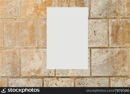 blank picture on a concrete wall . The empty white blank picture on a concrete wall closeup