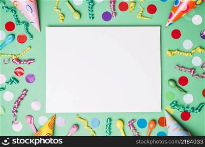 blank placard decorated with birthday items green background