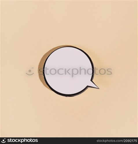 blank round speech bubble beige background