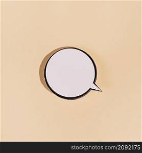 blank round speech bubble beige background