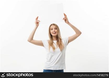 Blank sign. Woman holding empty blank white sign above her head. Excited and happy beautiful young woman isolated on white background. Blank sign. Woman holding empty blank white sign above her head. Excited and happy beautiful young woman isolated on white background.