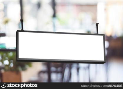 Blank signboard with blurred cafe background, stock photo