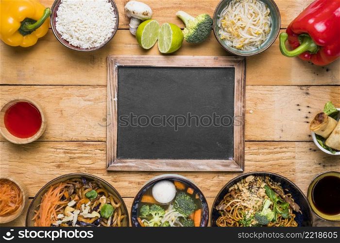 blank slate with traditional thai food wooden table