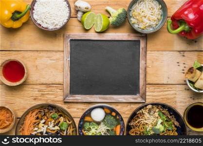blank slate with traditional thai food wooden table