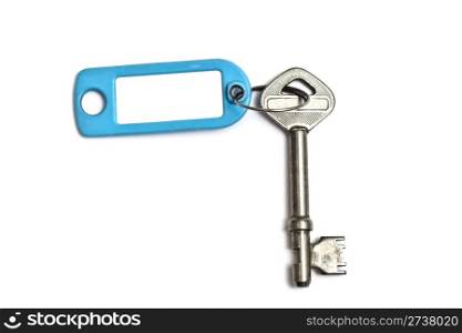 Blank tag and old key isolated on white background