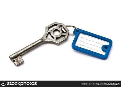 Blank tag and old key isolated on white background