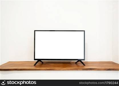Blank Television screen on cupboard isolated on white background. TV template with copy space.