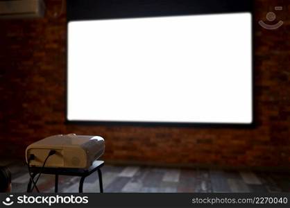 Blank TV projector and screen on wall for showing film. Video, movie or sport game streaming. Blank TV projector showing film to audience