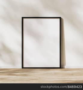 blank vertical black frame mock up, poster frame on wooden floor with sunlight with leaves shadow on white wall, 3d rendering