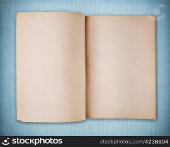 Blank vintage notebook on blue vintage paper