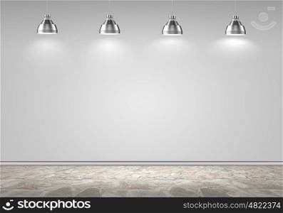 Blank wall. Blank wall with place for text illuminated by lamps above