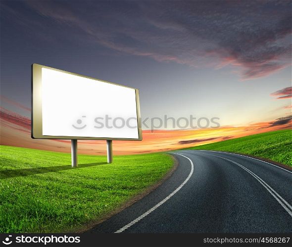 blank white billboard on the edge of country road