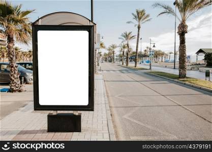blank white bus stop box sunlight