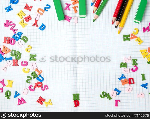 blank white sheet of squared papers and school supplies, back to school, flat lay