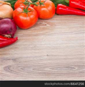 blank wooden board   with frame of  fresh colorful vegetables