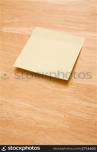 Blank yellow sheet on a table