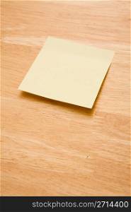 Blank yellow sheet on a table