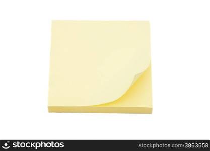Blank yellow sticky note block isolated on white background